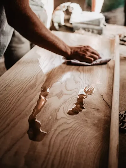 Carpenter refinishing wood furniture in Beirut